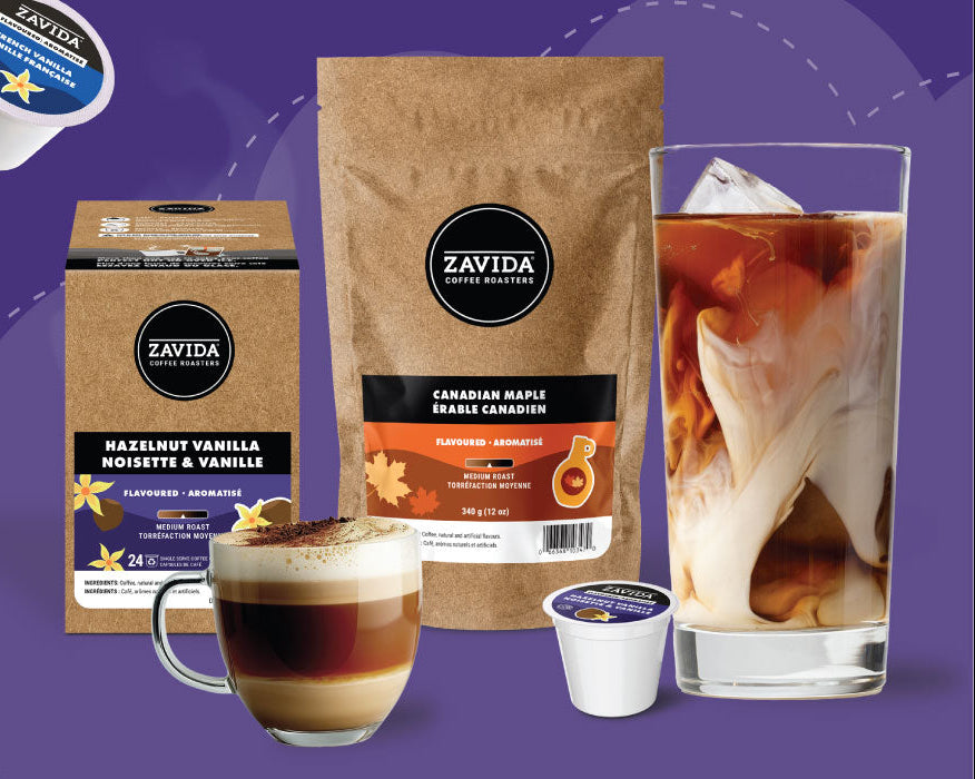 Promotional banner for Zavida coffee with packaging and coffee products on a purple background.